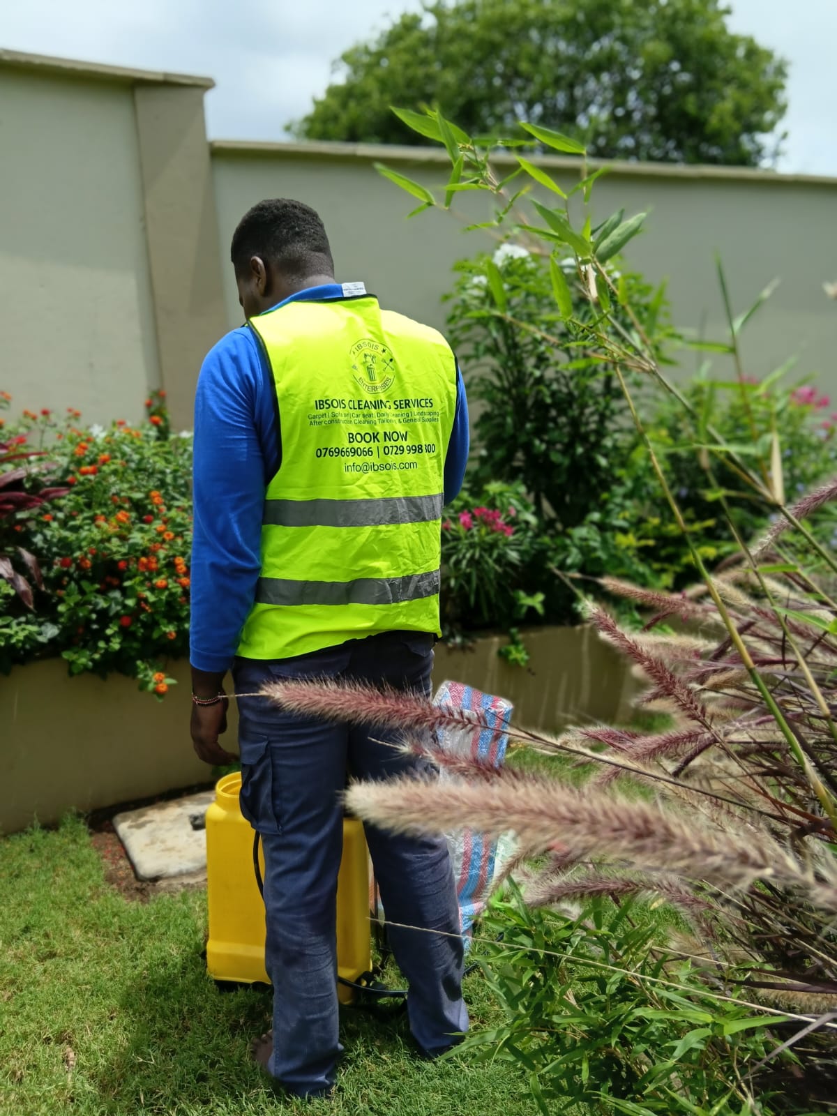Ibsois Cleaning Services team member providing garden maintenance